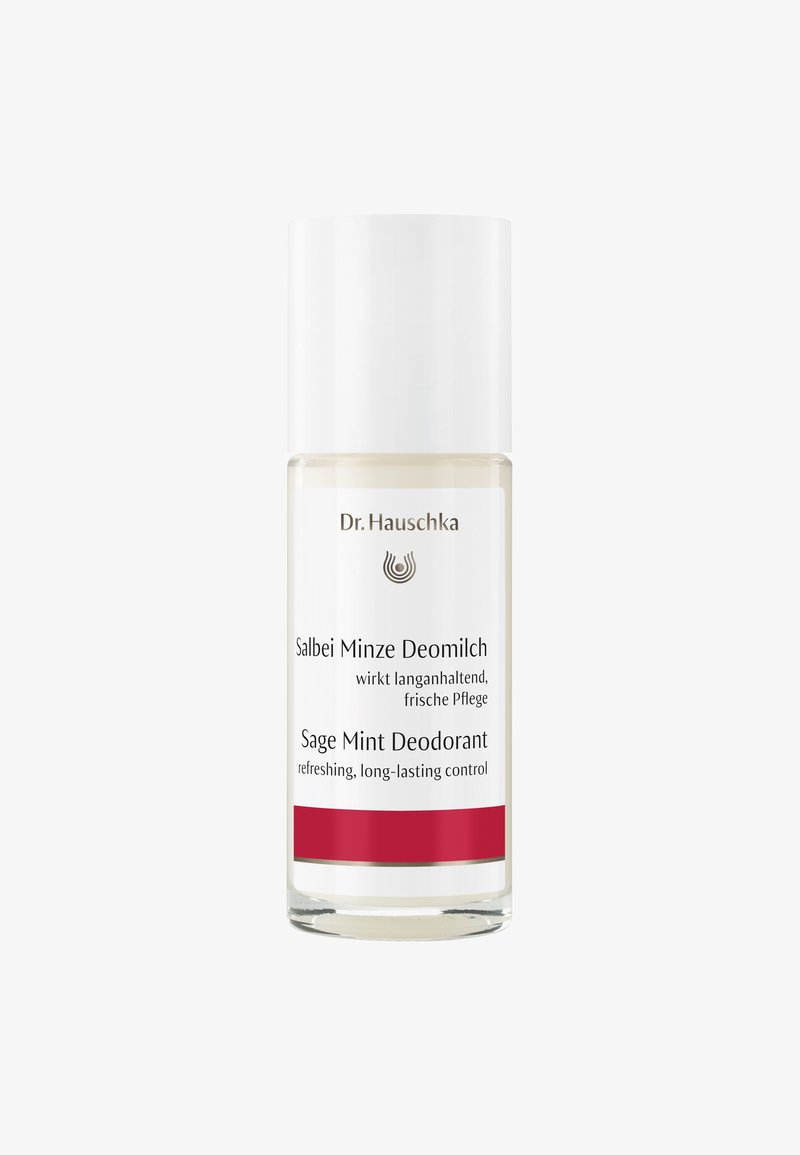 Bouteille de déodorant en verre clair avec un capuchon à vis blanc, étiquetée en noir et rouge avec "Salbei Minze Deomilch" et "Déodorant à la Sauge et à la Menthe."