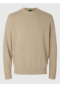 Beige strikket genser med lange ermer, rund hals, ribbestrikkede mansjetter og kant. Myk tekstur, minimalistisk design uten mønstre eller pynt.