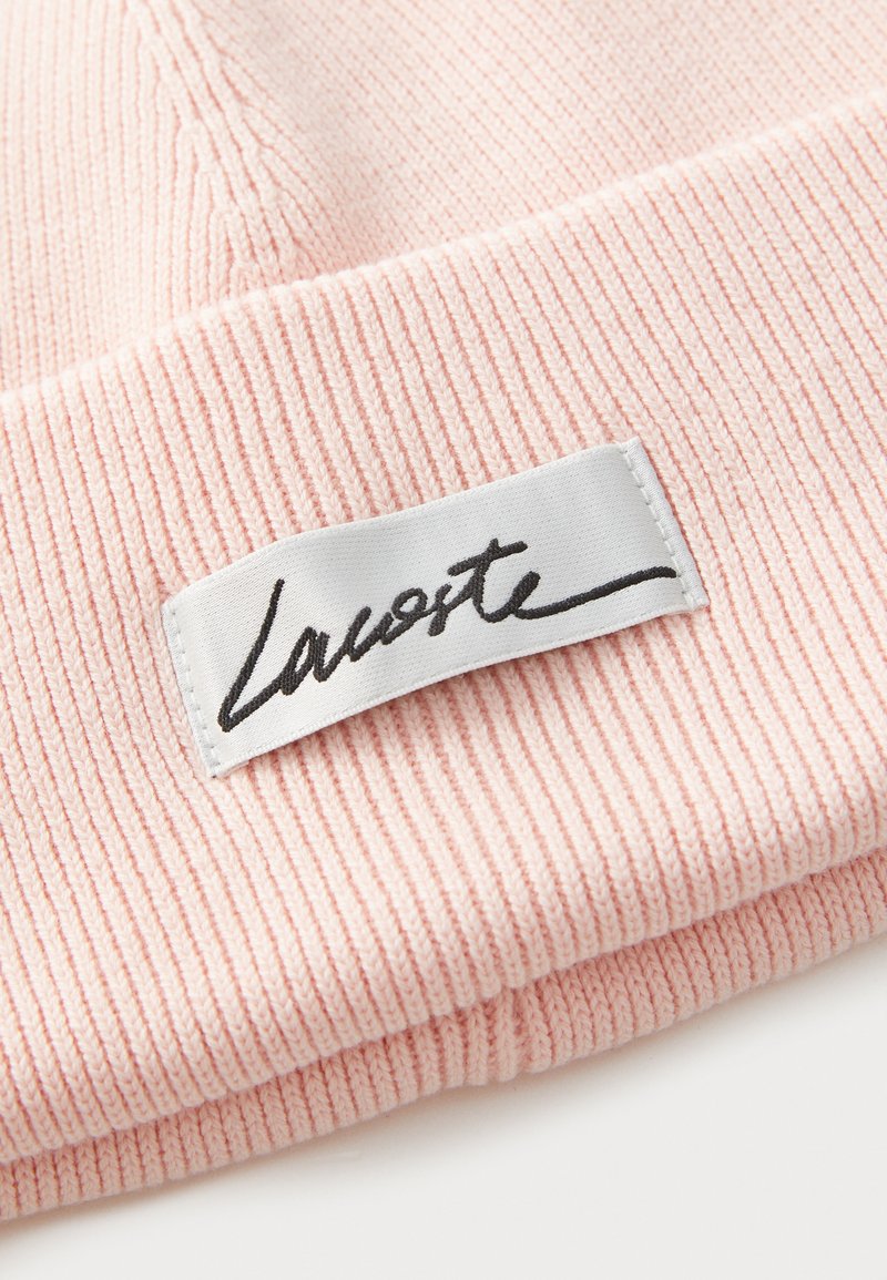 Bonnet en tricot côtelé pour femmes en Marron Bonnet en tricot côtelé pour femmes en Marron