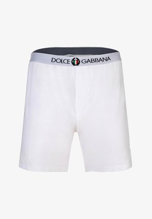 Boxer blancos de hombre con cintura gris con el texto "Dolce & Gabbana" y un pequeño emblema de la bandera italiana en el centro.