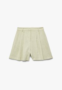 Bermuda in lino verde chiaro con pieghe, dotata di una vita aderente e una silhouette sartoriale. Lunghezza corta con una texture pulita e liscia.