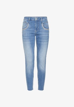 Heledad sinised kitsad teksapüksid, millel on tuhmunud viimistlus, keskmise kõrgusega vöökoht, viie taskuga disain ja kerge kulumine sääre ääres.