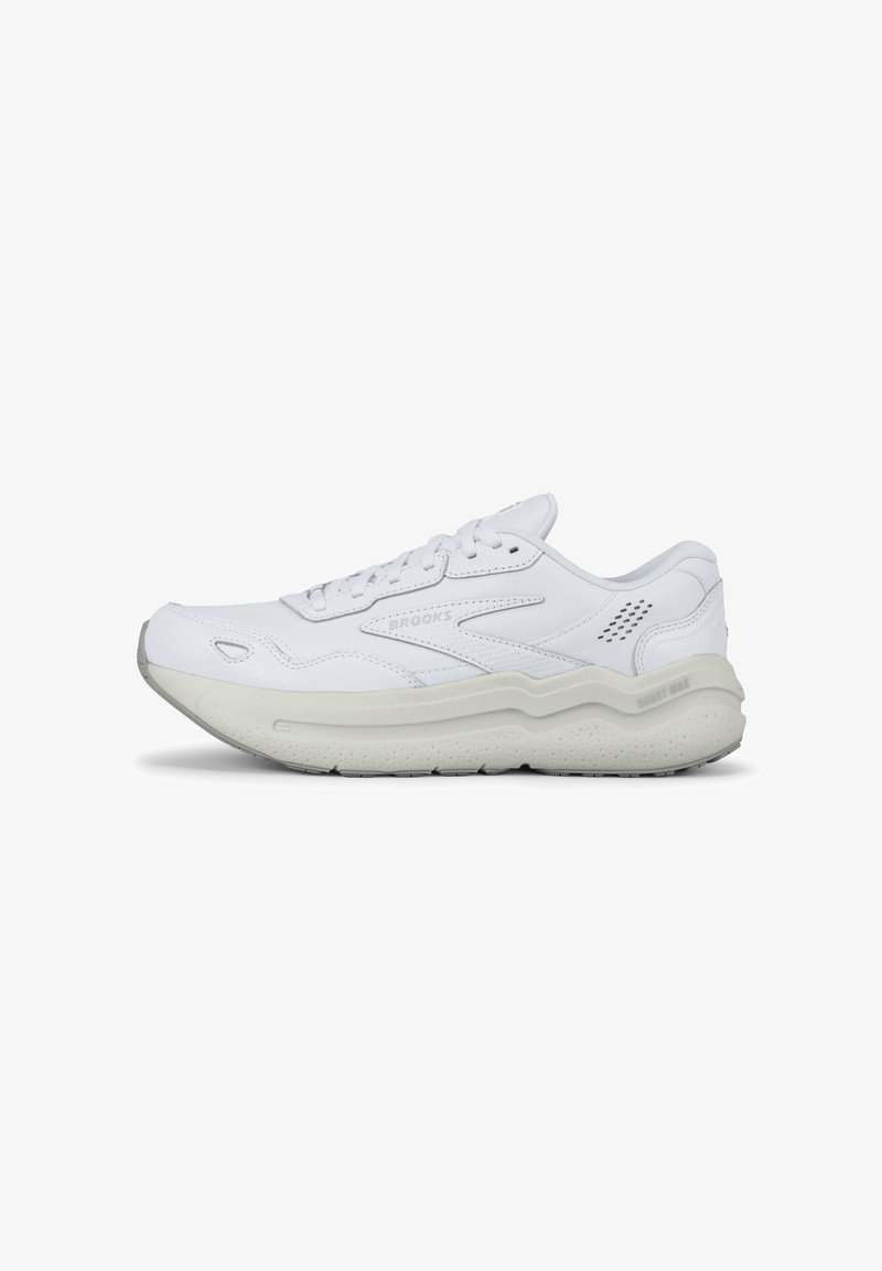 Valged sneakers sileda nahakattega, pehme tallaga, tekstuuritud detailidega ja külgedel ventilatsiooniks augud.