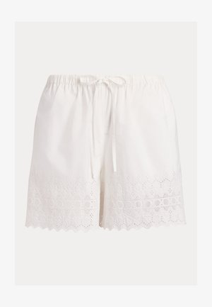 Hvite bomullsshorts med elastisk midjebånd, snøring og blondekant med hullbroderi langs bølget kant.