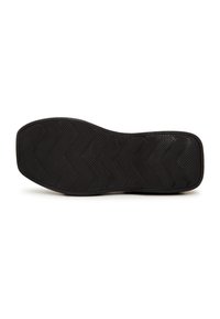 Suola di scarpe nera con un motivo a zigzag, caratterizzata da una superficie testurizzata e bordi arrotondati per una buona presa e stabilità.