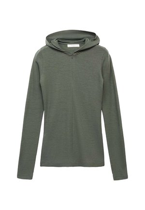 Dolga majica s kapuco v olivno zeleni barvi. Narejena je iz teksturirane tkanine z zasnovo na pol zadrgo spredaj. Ima sproščen kroj in preprost dizajn.