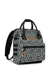 Floral print backpack with black and white pattern, black leather accents, two top handles, adjustable straps, and front zip pocket.