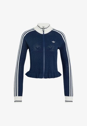 Granatowa kurtka zapinana na zamek, z białymi paskami na rękawach, białym kołnierzem i mankietami, logo Adidas na piersi oraz marszczonym dołem.