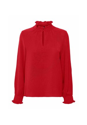 Blusa rossa a maniche lunghe con colletto alto a frange, apertura a chiave sul davanti e polsini a frange.