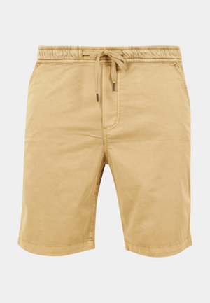 Beige bomullsshorts med elastisk midje, snøring og sidelommer. Stoffet har en glatt tekstur og en avslappet passform.
