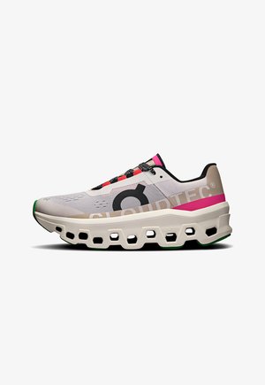 Lightweight running shoe in gray and white with black accents, featuring a thick, cushioned sole with cutouts, and colorful laces.
