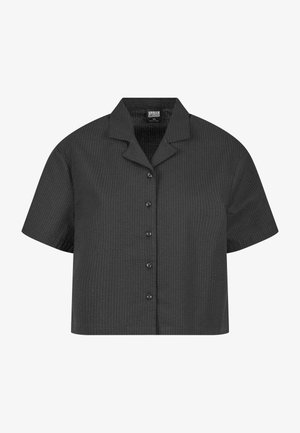 Short-sleeved, cropped shirt in textured black fabric with a collar, featuring front buttons and a relaxed fit.