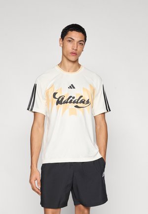 TIRO - Nyomott mintás póló - off white/black/semi ice tangerine