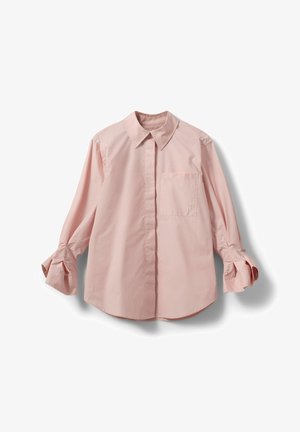 Roosa nööbitav särk, mis on valmistatud puuvillast, krae, pikad varrukad ja seotud mansetid. Omab rinnaehost. Sile tekstuur.