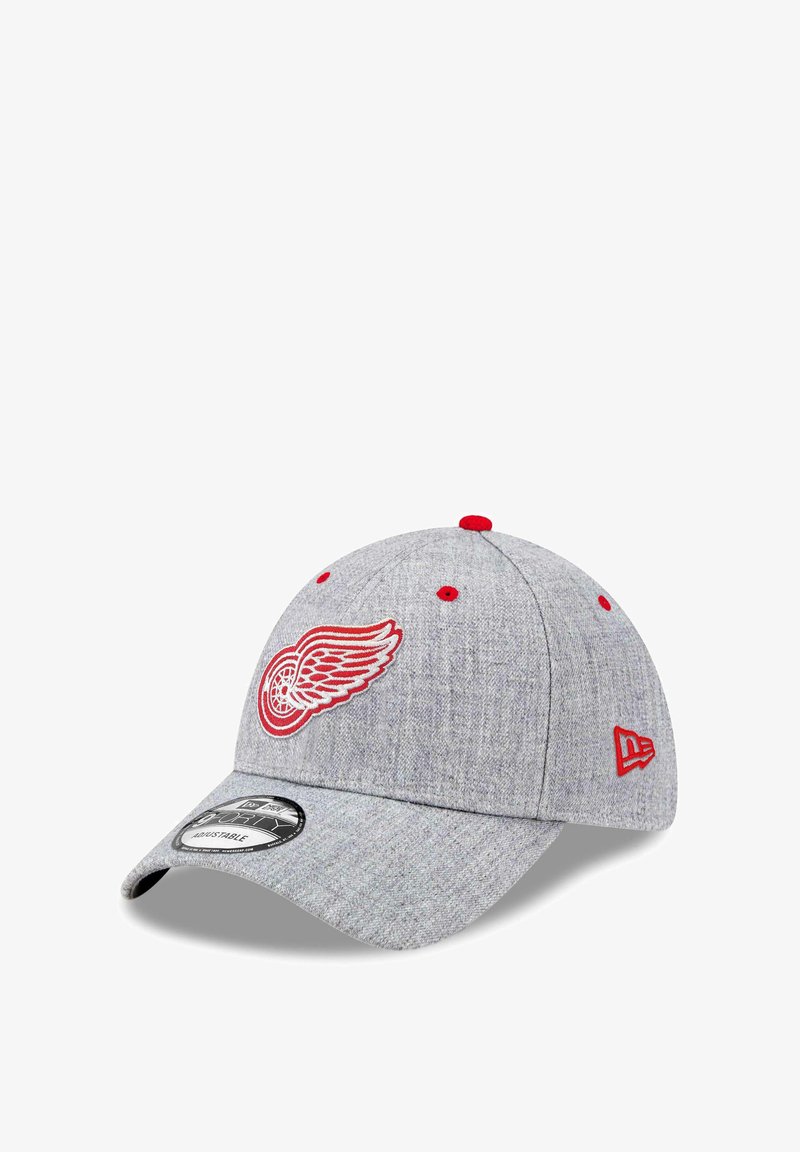 Gray cap made of textured fabric, featuring a red embroidered logo on the front and red accents on the eyelets and button. Curved brim.