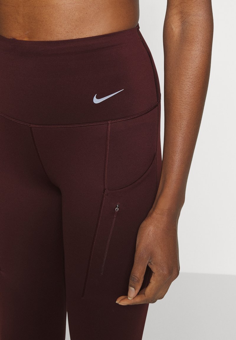 Nike Performance NIKE GO WOMEN'S FIRM-SUPPORT HIGH-WAISTED 7/8 LEGGINGS  WITH POCKETS - Tights - burgundy crush/black/bordeaux 