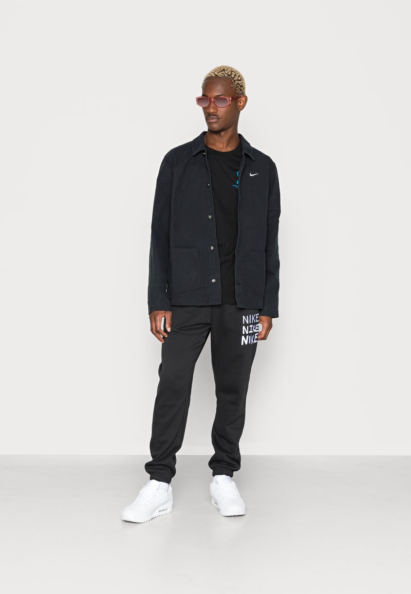 Nike Sportswear CHORE COAT - Lehká bunda - black/white