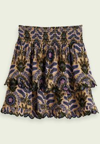 Lag-på-lag nederdel med blomstermønster i sennepsgul med flæsekant; har blå, grønne og lilla accenter; elastisk taljebånd.