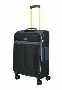 Valise souple noire avec poignée télescopique jaune, quatre roues pivotantes, poche avant zippée et poignée latérale.