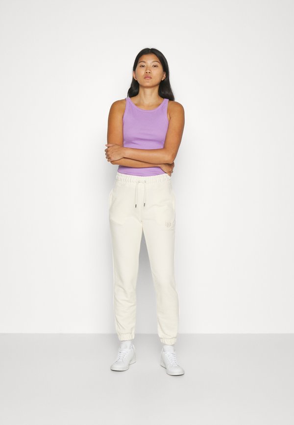 TONAL SHIELD - Tracksuit bottoms - linen3