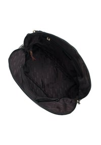Black handbag interior with smooth fabric lining, featuring two zippered pockets and a spacious main compartment with subtle branding throughout.