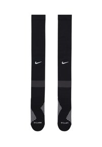 Calze sportive nere con logo Nike, caratterizzate da una texture liscia, strisce verticali sulla soletta e marcate "SINISTRA" e "DESTRA" sui polsini.