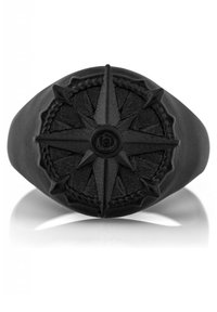 Black ring featuring a detailed compass design on a raised circular setting with a textured surface and sturdy band.