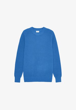 Zils adīts džemperis ar ribveida tekstūru, apaļu kakla izgriezumu un garām piedurknēm. Apakšmala un aproces arī ir ar ribveida rakstu, lai pievienotu papildus detaļas.