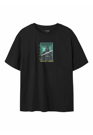 Zwarte katoenen T-shirt met korte mouwen, featuring een graphic van Darth Vader binnen een rasterpatroon, verfraaid met groene en gele tekst.