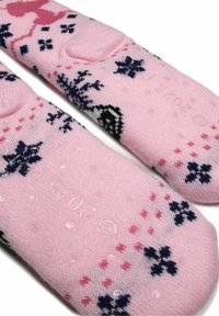 Pink socks with floral patterns in navy and light pink, featuring rubber grips on the sole for traction. Soft knit material.