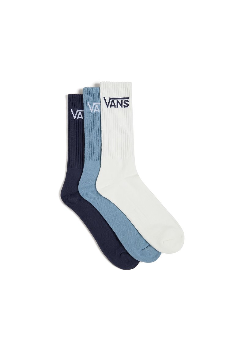 Tres pares de calcetines Vans: azul marino oscuro, azul claro y blanco. Textura acanalada con el logo en el puño en azul marino. Tejido de mezcla de algodón.