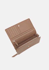 Brown leather wallet with textured exterior, multiple card slots, a zippered compartment, and a snap button closure.