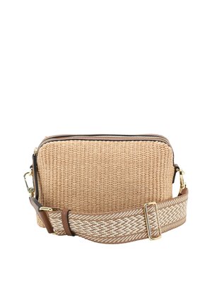 Rectangular woven beige crossbody bag with a wide adjustable patterned strap and gold-tone metal clasps against a white background.