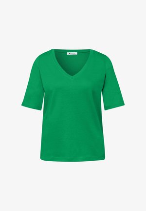 Chemise verte à manches courtes avec col en V, coupe décontractée, en tissu lisse, présentée sur un fond blanc.