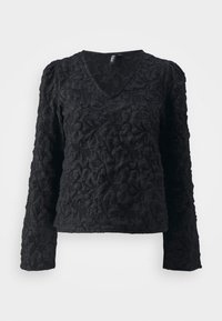 Maglietta nera a maniche lunghe con scollo a V, caratterizzata da un motivo floreale testurizzato, con un design delle spalle leggermente arricciato e una vestibilità morbida.