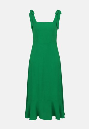 Grøn ærmeløs midi-kjole med firkantet udskæring, bindebånd på skuldrene, tætsiddende overdel og udvidet skørt.