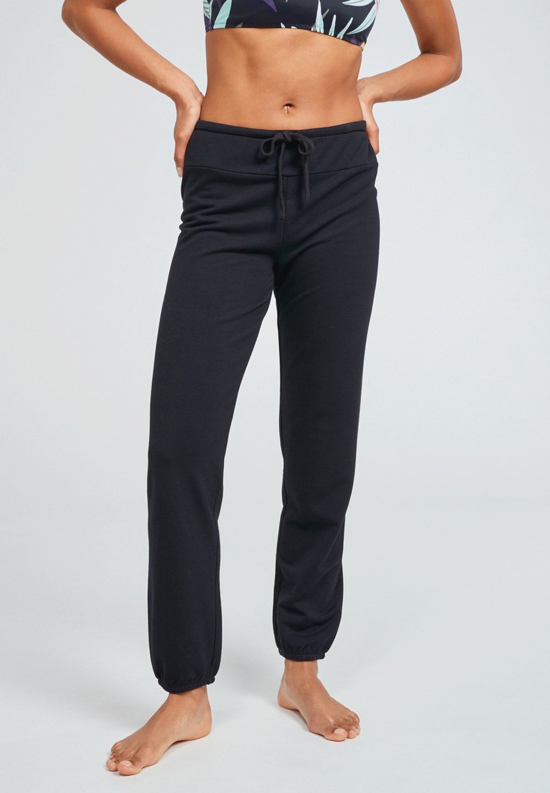 Roxy SURFING BY MOONLIGHT Tracksuit bottoms anthracite Zalando.de