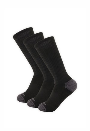 Trois chaussettes noires basses avec des bouts et des talons renforcés gris, alignées côte à côte sur un fond blanc.