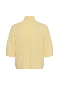 Pull en maille jaune clair à manches courtes avec un col haut, vu de dos sur fond blanc.