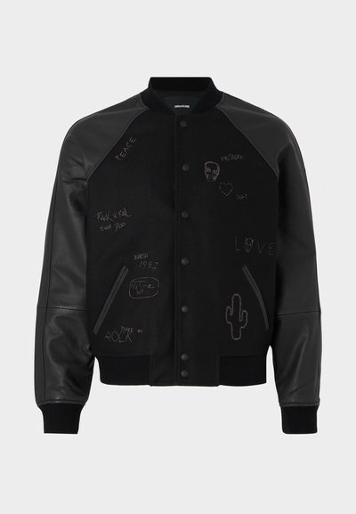 Black bomber jacket with leather sleeves, snap closure, and embroidered graphics including text and designs on the front.