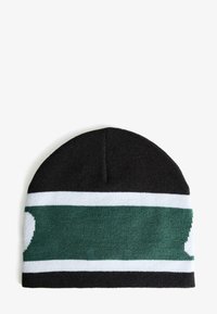 Black knit beanie with a green and white striped band, featuring a circular pattern on the side. Soft texture with a rounded crown.