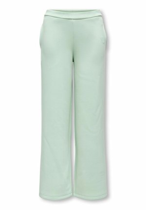 Pantaloni verde chiaro a gamba larga con vita elastica e delicato dettaglio cuore ricamato sull'anca destra, mostrati su sfondo bianco.