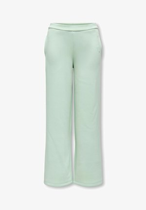 Pantaloni verde chiaro a gamba larga con vita elastica e delicato dettaglio cuore ricamato sull'anca destra, mostrati su sfondo bianco.