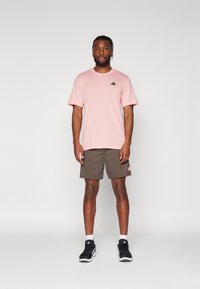 adidas Performance TR-ES FR T - Camiseta deportiva - semi pink spark/black