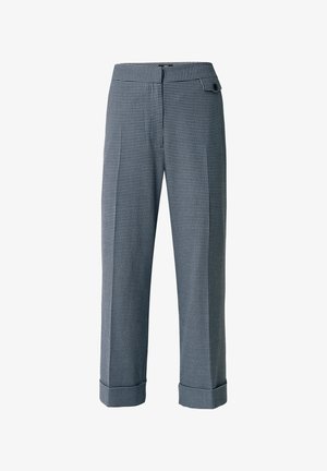 Pantaloni a scacchi blu e bianchi, con una vestibilità sartoriale, orli cuciti, fronte piatto e tasche laterali. Presentano una chiusura con bottone e zip.