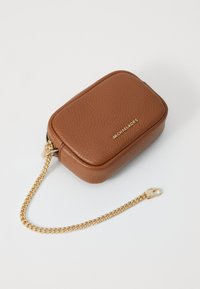 Brown textured leather rectangular bag featuring a gold chain strap and embossed logo on the front. Zipper closure along the top.