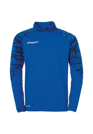 Blå atletisk pullover med sort geometrisk mønster på skuldrene. Har en høj krave og halv-zip design. Fremstillet af letvægtsstof.