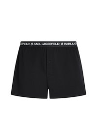Czarne bokserki wykonane z miękkiej bawełny, z guzikiem w kroku. Pas nosi napis "KARL LAGERFELD" na białym tle na czarnym tle.