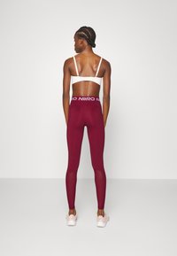 Nike Performance 365 - Leggings - dark beetroot/white