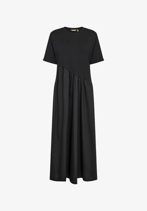 Černé šaty s krátkým rukávem a kulatým výstřihem, kombinující přiléhavou část a nařasenou, volnou sukni. Vyrobeno z měkké bavlněné tkaniny.